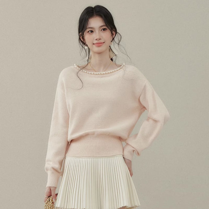 【tops】パール付きニットトップス Q7593